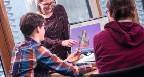 Featured image shows someone being taught a class on 3D modelling. Photo via EOS.
