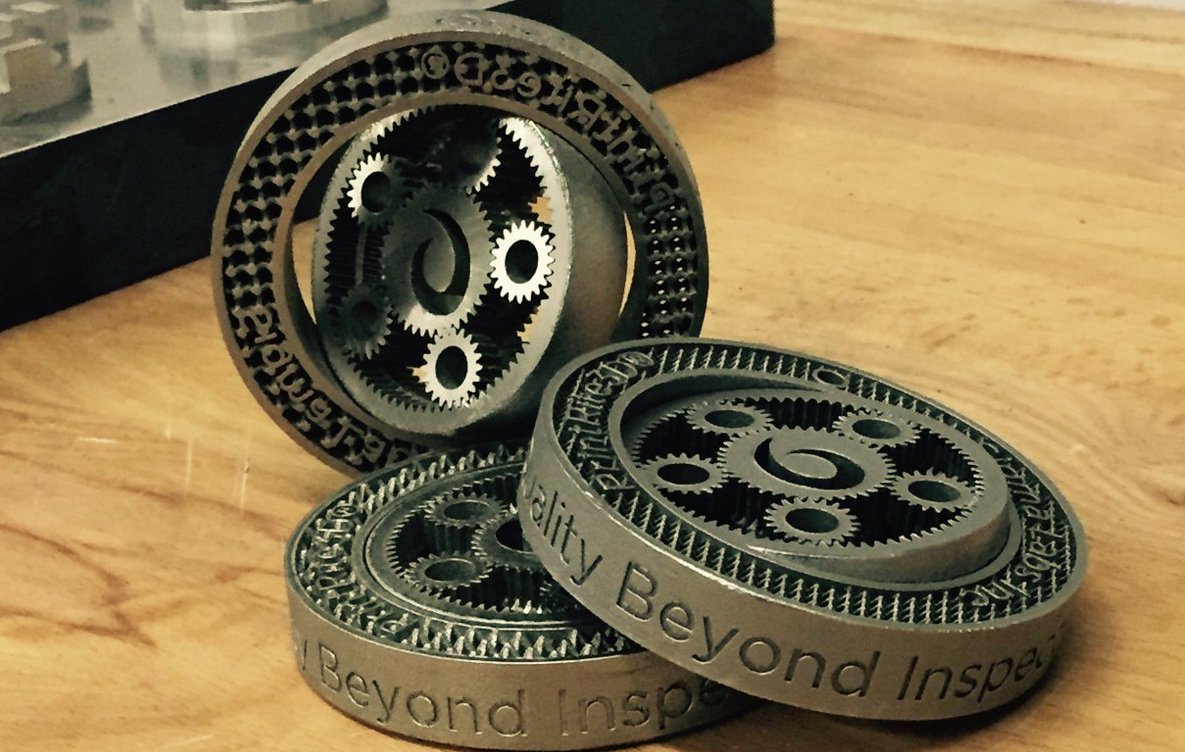 Planetary Gears 3D printed using PrintRite3D inspection software. Features the motto 
