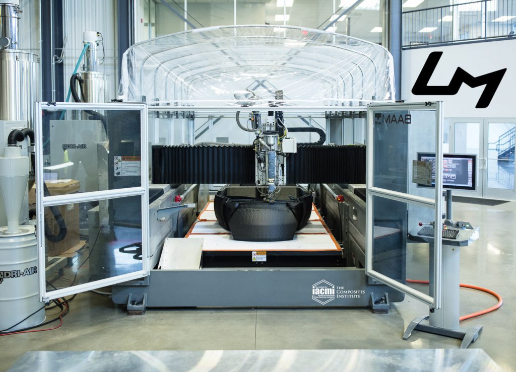 ORNL's A Big Area Additive Manufacturing (BAAM) machine in use to print the Strati car. Photo via IACMI