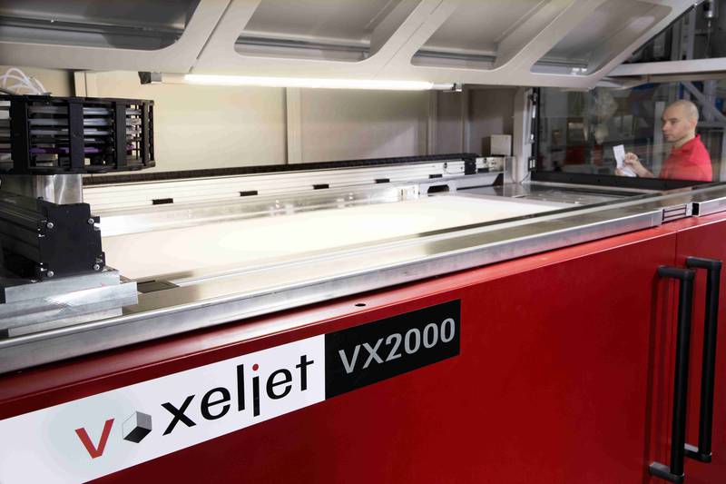 Under the hood of the VX200 industrial 3D printer. Photo via voxeljet
