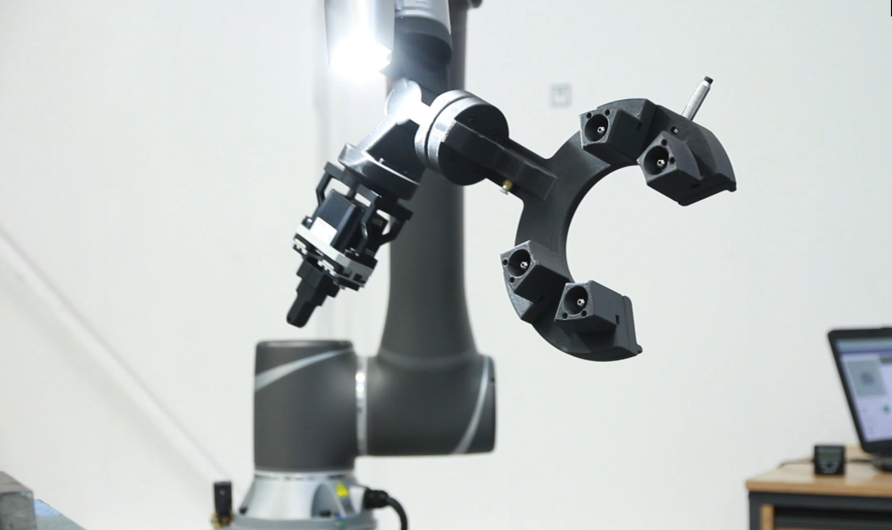 End-of-arm tooling produced on the Fortus 380CF in action on a robotic arm. Photo via SYS.