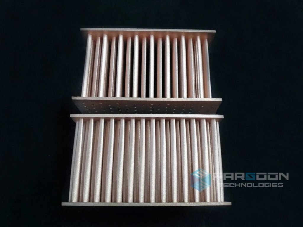 Two 3D printed copper heat exchangers. Image via Farsoon Technologies