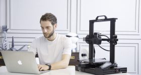 Featured image shows someone using a Creality CR6-SE 3D printer. Photo via Creality.