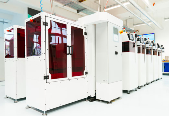 Up to five of the company's new machines can be connected together to form a dental production line. Photo via Rapid Shape.