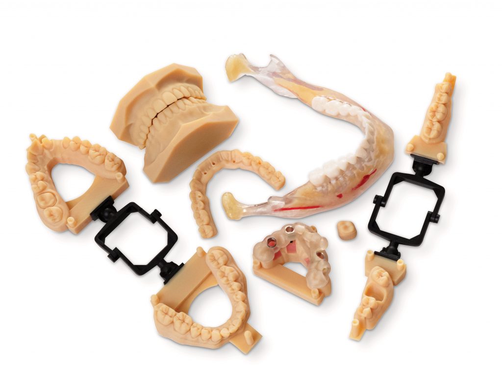 Dental parts 3D printed with the J5 DentaJet. Photo via Stratasys.