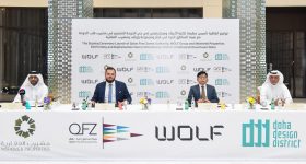 The ceremony announcing the partnership between QFZA, WOLF Group and Msheireb Properties was held in the Doha Design District. Photo via Qatar Free Zones.