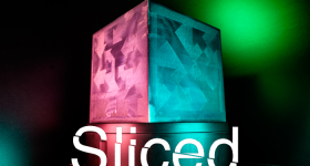 Sliced logo on an image of the Structure and Reflectance cube. Photo via NTU.