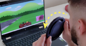 研究人员使用3D打印方向盘控制器玩游戏。