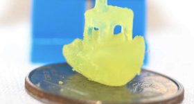 A tiny resin benchy 3D printed by the Stanford researchers. Photo via Dan Congreve.