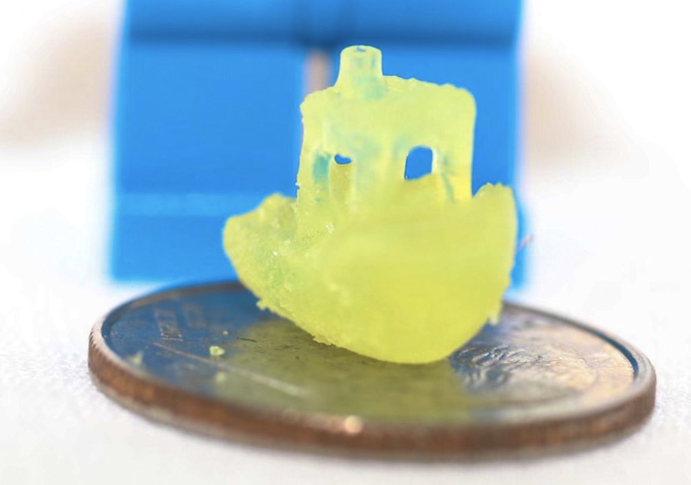 A tiny resin benchy 3D printed by the Stanford researchers. Photo via Dan Congreve.